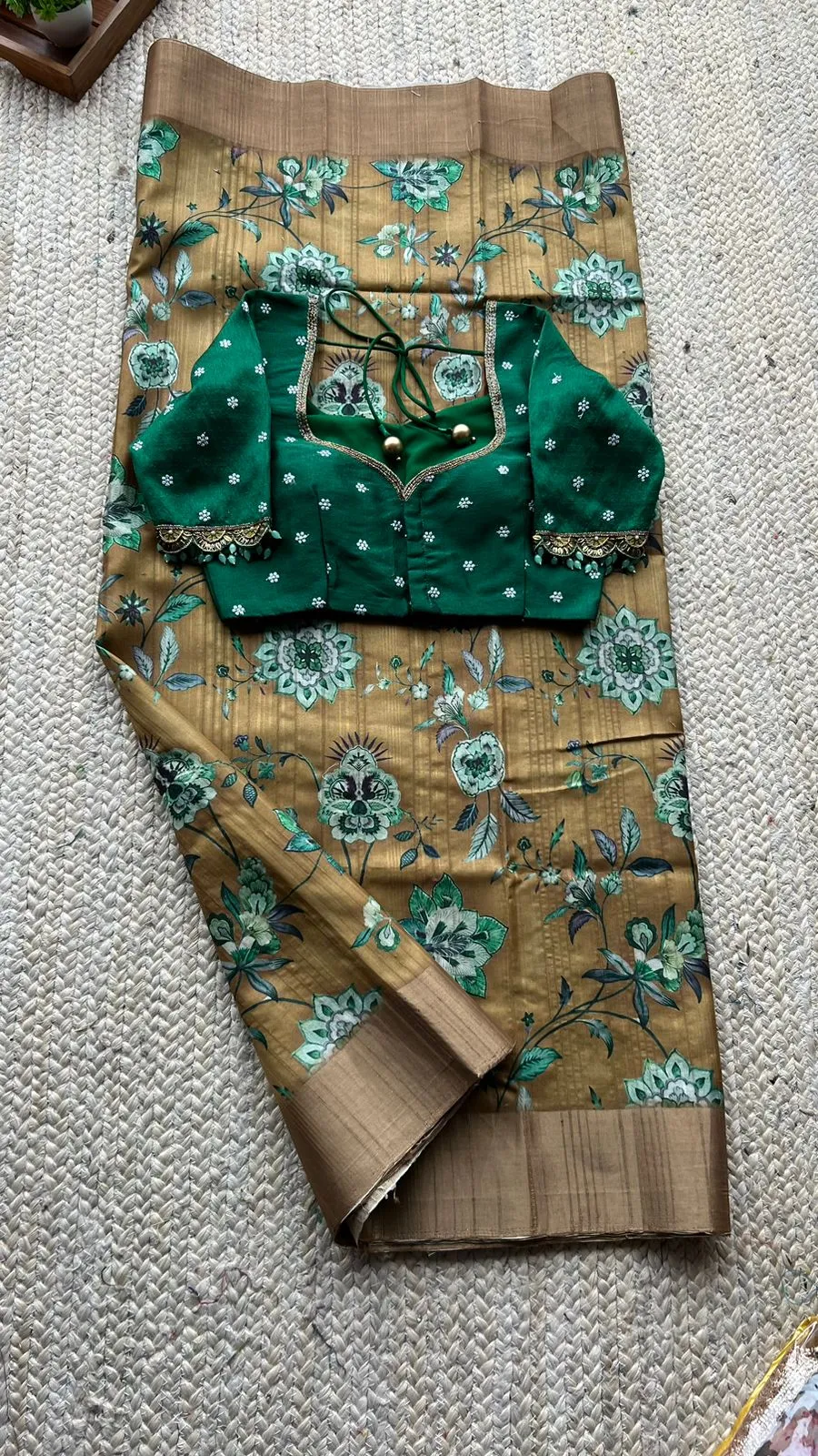 Fenugreek floral tussar silk saree with hand work blouse